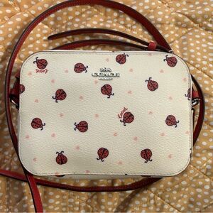 Coach Cream and Red Ladybug Crossbody Bag